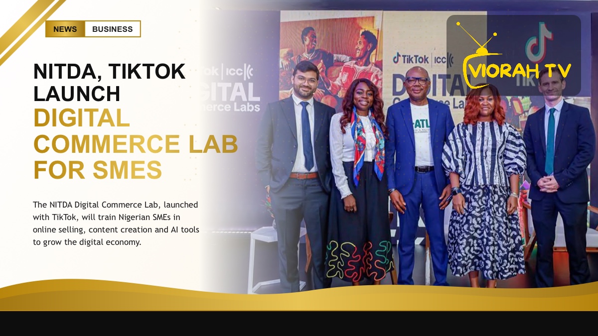 Nigerian small business owner using a phone, linked to the NITDA Digital Commerce Lab