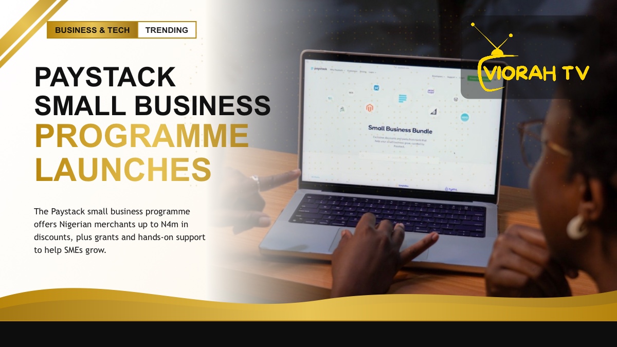 Small business owner using a payment terminal under the Paystack small business programme
