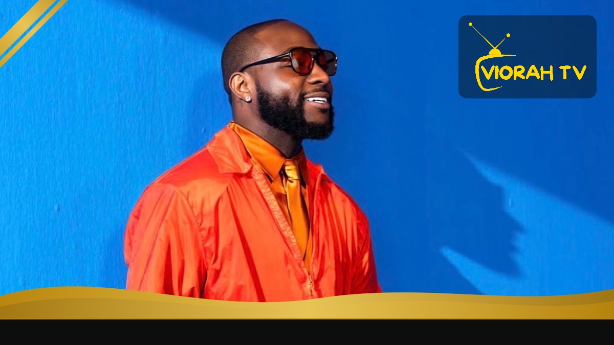 Davido, Nigerian-American Afrobeats singer and DMW founder, performing on stage